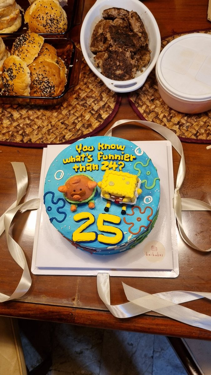 adroitcell's tweet photo. my and my gf's bdays are almost the same (may 24 and 26) and we decided to make a joint birthday on 25 on our 25th bday!

we made it spongebob themed and look at our gorgeous cake! https://t.co/0SjXymGFT1