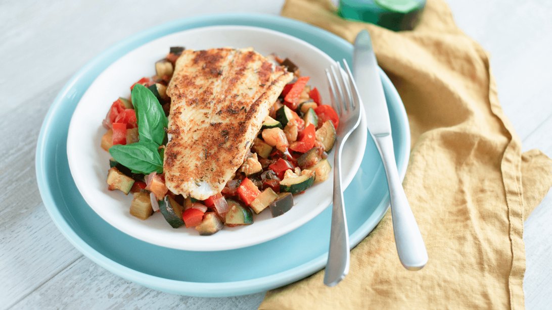 Mild-flavoured basa fish gets a kick of Cajun in this traditional Louisiana favourite. 🐟️🌿 Try this Blackened basa fillet with ratatouille, this weekend: bit.ly/3QWc6uk.