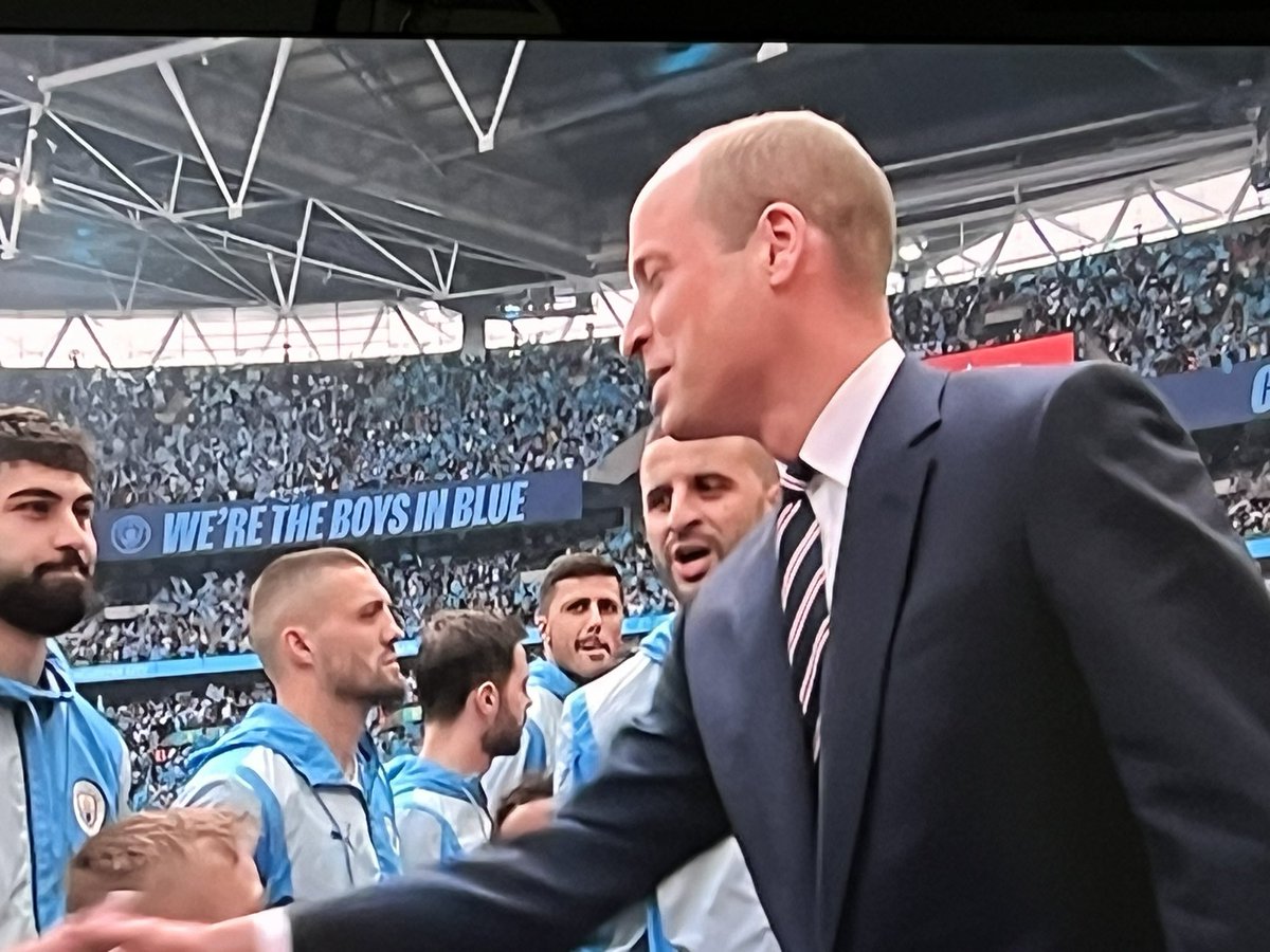 Prince William meeting the teams and singing the national anthem before the FA Cup Final between Manchester City and Manchester United at Wembley Stadium this afternoon.