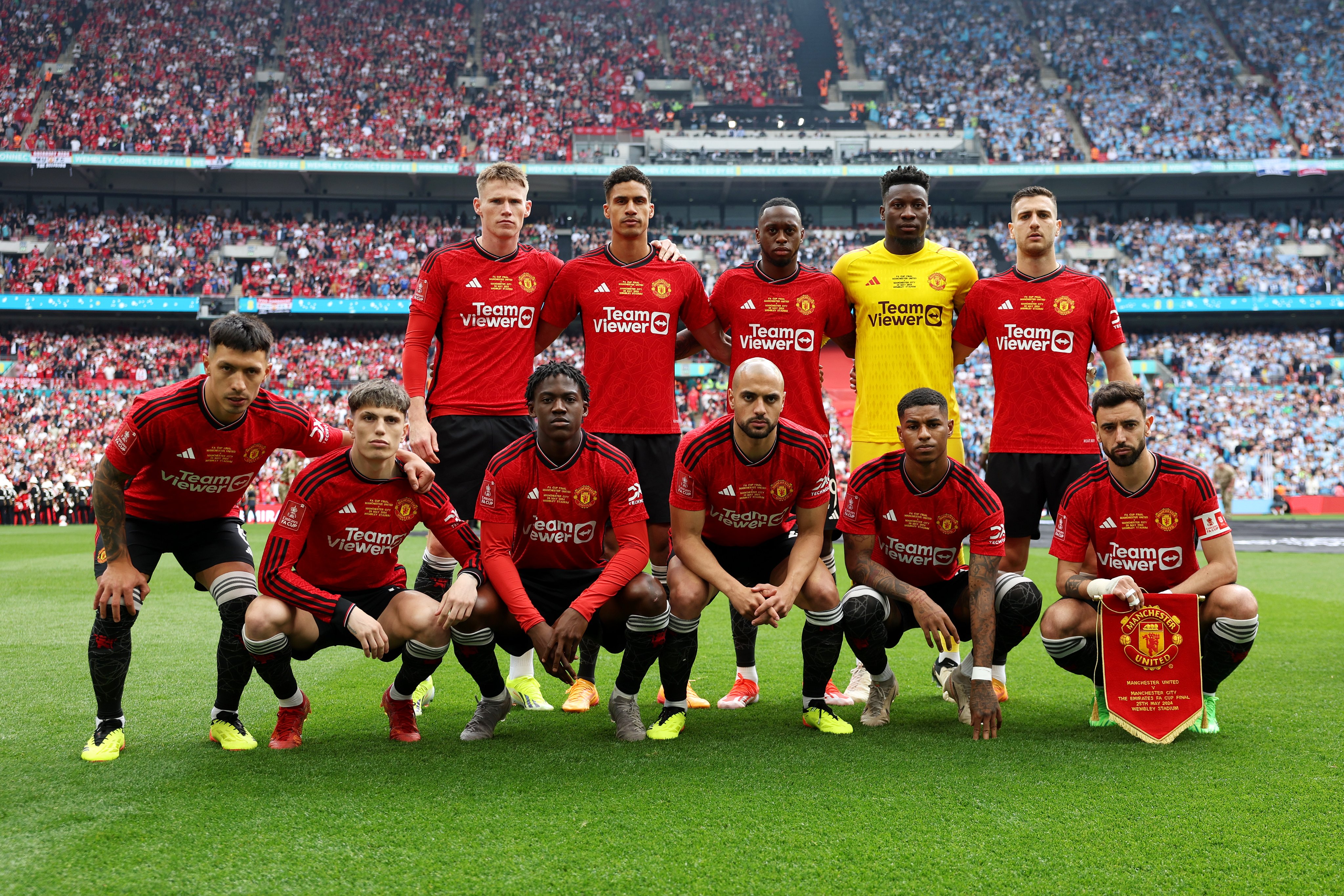 An image of Manchester United players posing for a photo ahead of the 2024 Emirates FA Cup Final