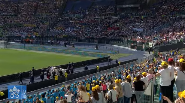 Pope Francis arrives at Rome's Olympic Stadium for the first World Children's Day. More than 40,000 children, adults, representing 101 nations, are present for the first day of festivities May 25.