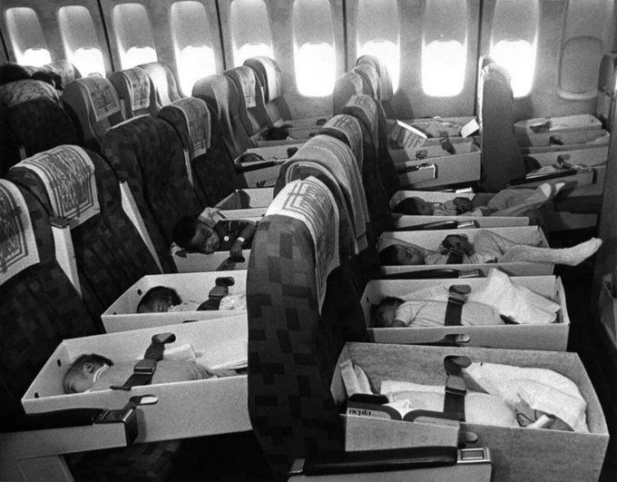 Vietnamese orphans being airlifted to the US for adoption in 1975.