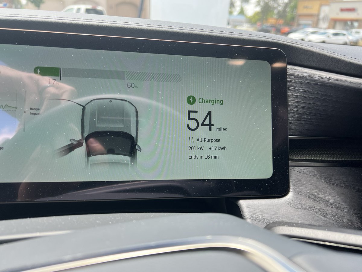 Awesome @TeslaCharging site in Roseville CA (Harding) V4 dispenser, magic docks, couple of pull in spots for non-teslas. Good speeds on the @Rivian  R1T