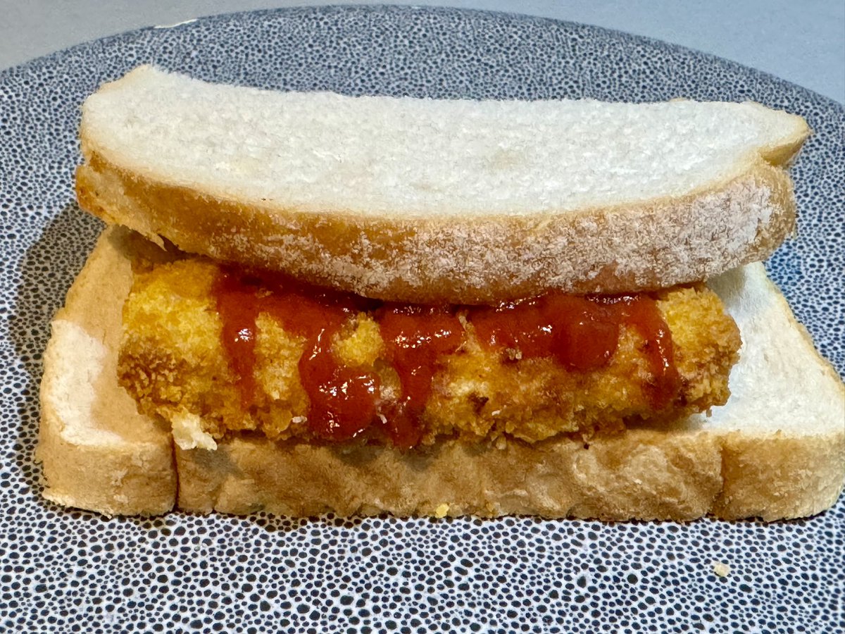 Simply the best. Fish Finger Butty with Red Sauce.
