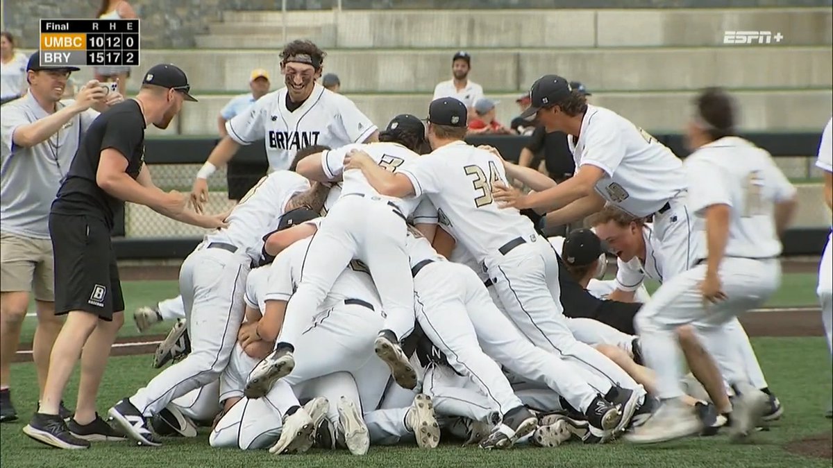 Dogpile! Bryant wins the America East baseball championship, 15-10 over UMBC. Winning their first title in the conference in just their second year as a member. First trip to the NCAA tournament since 2016, when they won the NEC. 📸: ESPN+ @ABC6 @_BryantBaseball