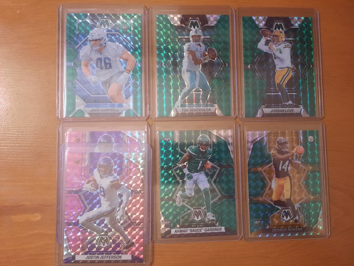 #KopStacks Lot 63 #sportscardsforsale #sportscards #TheHobbyFamily #thehobby @CodiDaReposter @GotdemCards $2 each Jack Campbell Green RC Tua Tagovailoa Green Jordan Love Green George Pickens Green RC Ahmad 'Sauce' Gardner Green RC Justin Jefferson Pink Camo x 2