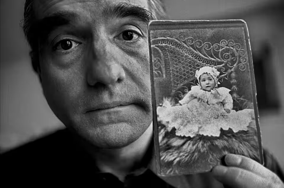 Portrait of Martin Scorsese with a picture of his mother as a child. Ferdinando Scianna.