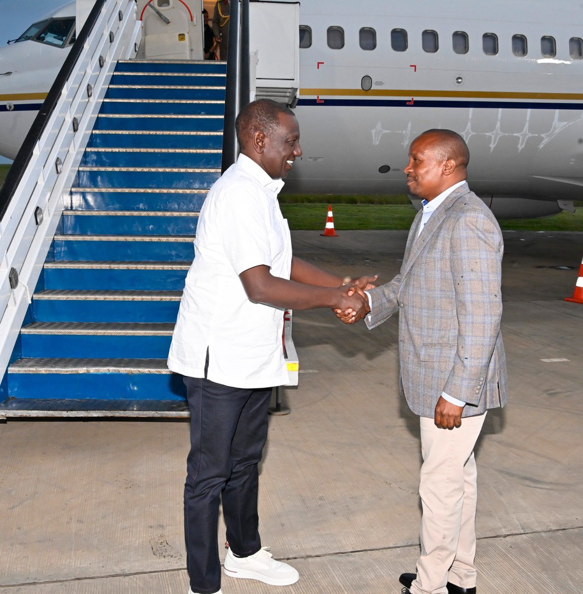 CS Kindiki receives William Ruto as he jets back from the US trip.