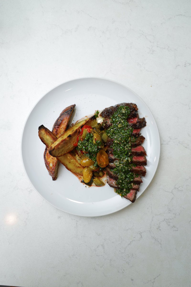 Yesterday’s dinner: Steak w/ chimichurri and roasted Japanese sweet potatoes + cherry tomatoes & bell peppers.