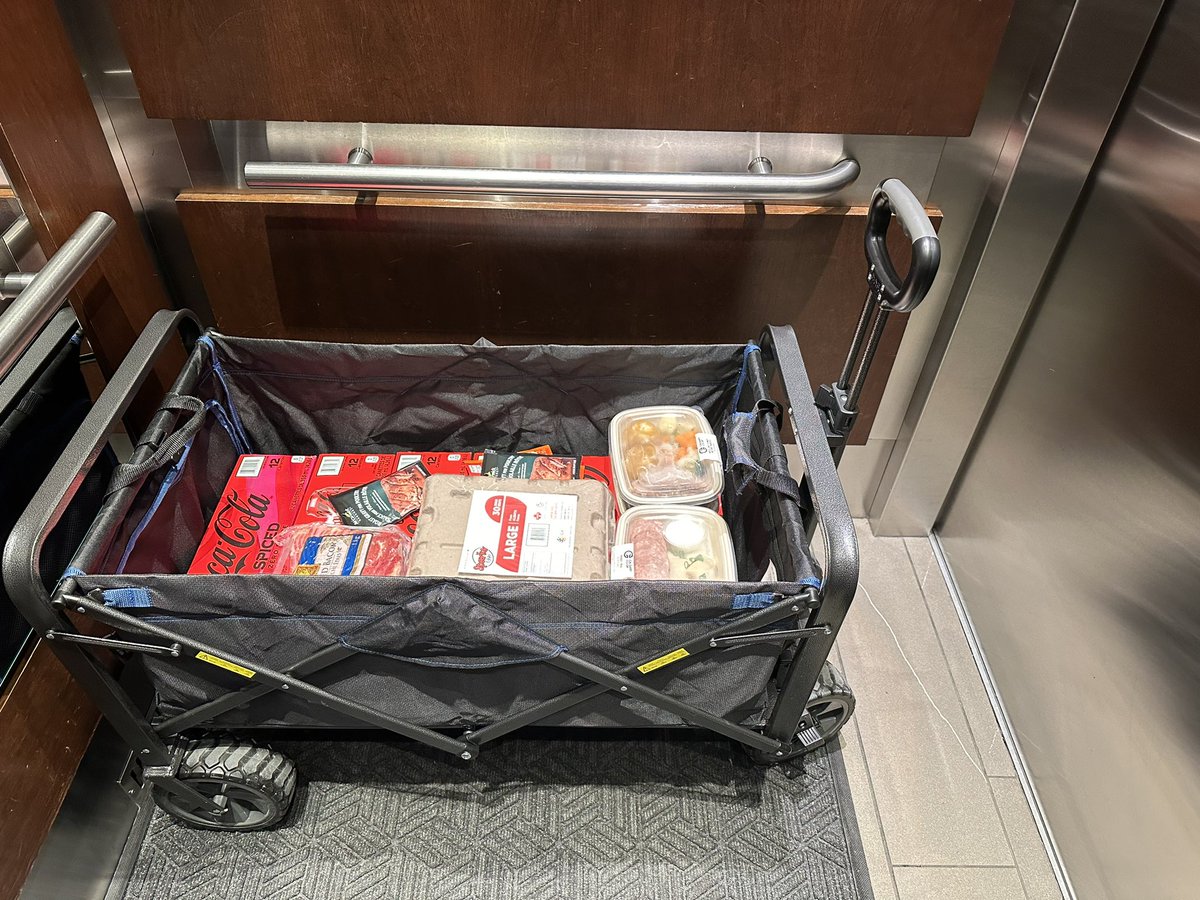 Our condo life saviour. So glad we purchased this grocery transport. Fits perfectly in our elevator, folds small to put in closet, has cup holders and  storage pockets. Genius! #CondoLife #yyc
