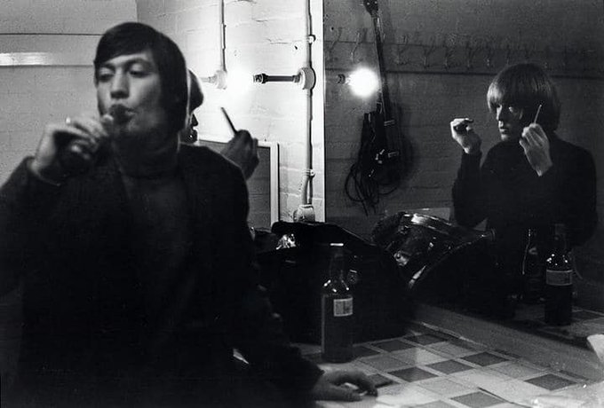 Charlie Watts and Brian Jones backstage