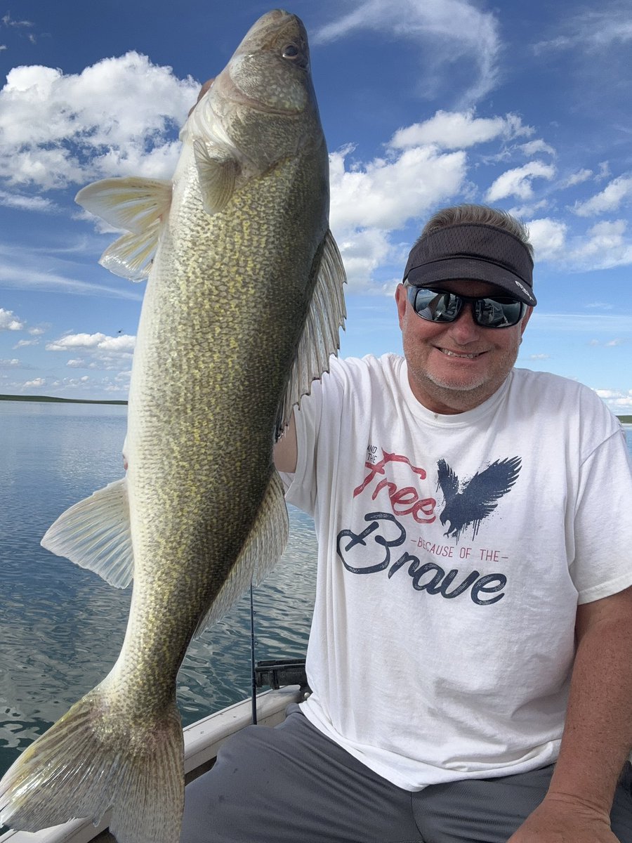 On the board with a 25” walleye