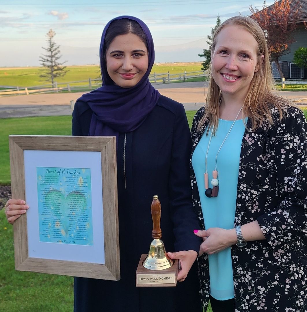 WHCroxford's tweet photo. Congratulations to Ms. Qureshi who won the Edwin Parr Award for excellence in first year teaching at the Zone 5 presentation in Langdon last night! We are so proud of her and honoured to have her as part of our WH Croxford community! #rvsed #allfororange https://t.co/u1sRbMomCM