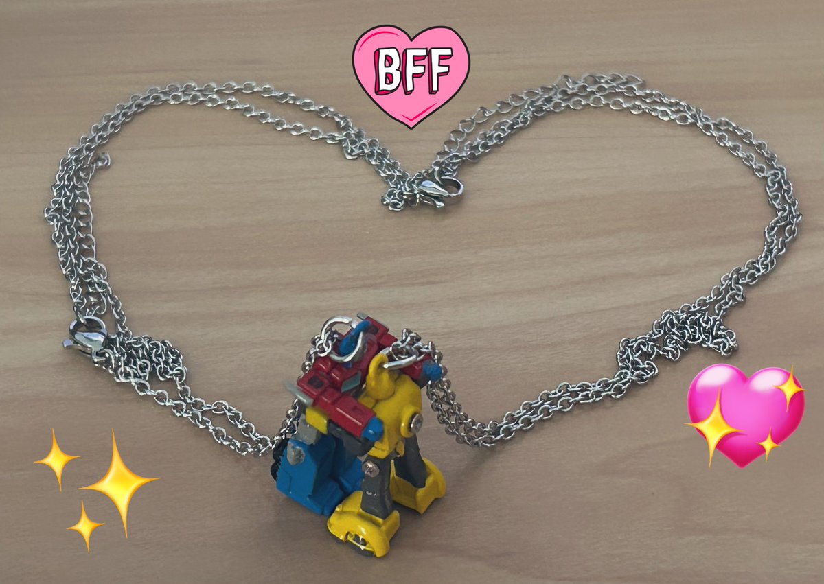 The optimus and bumblebee posable BFF necklaces are so silly