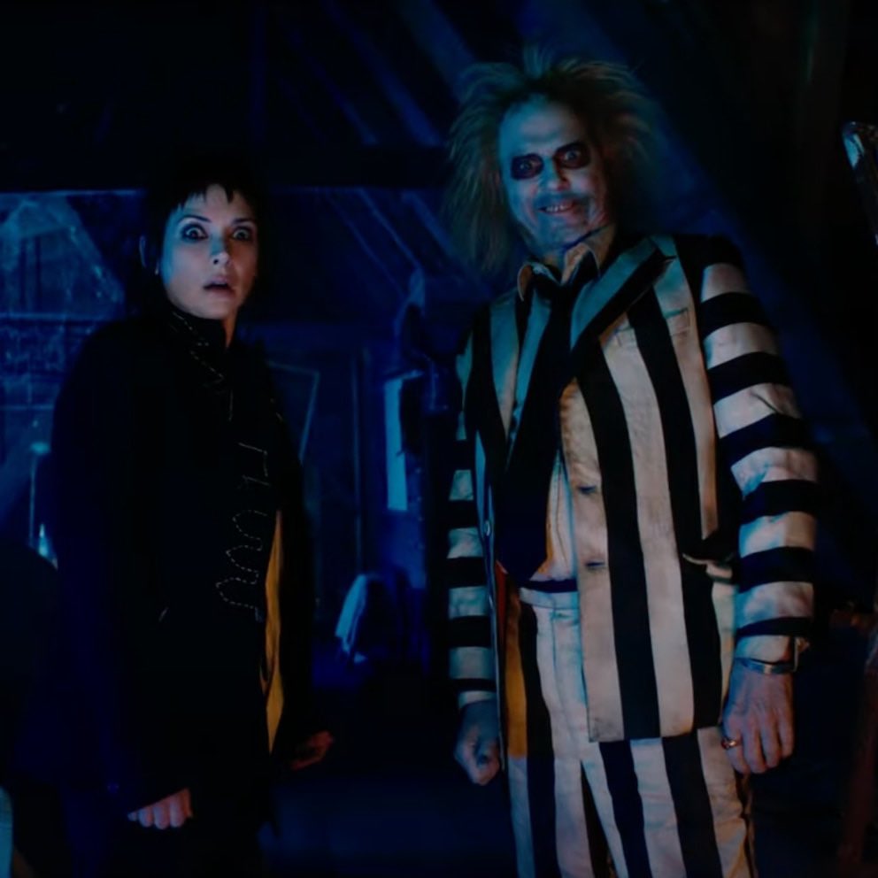 Winona Ryder as Lydia and Michael Keaton as Beetlejuice