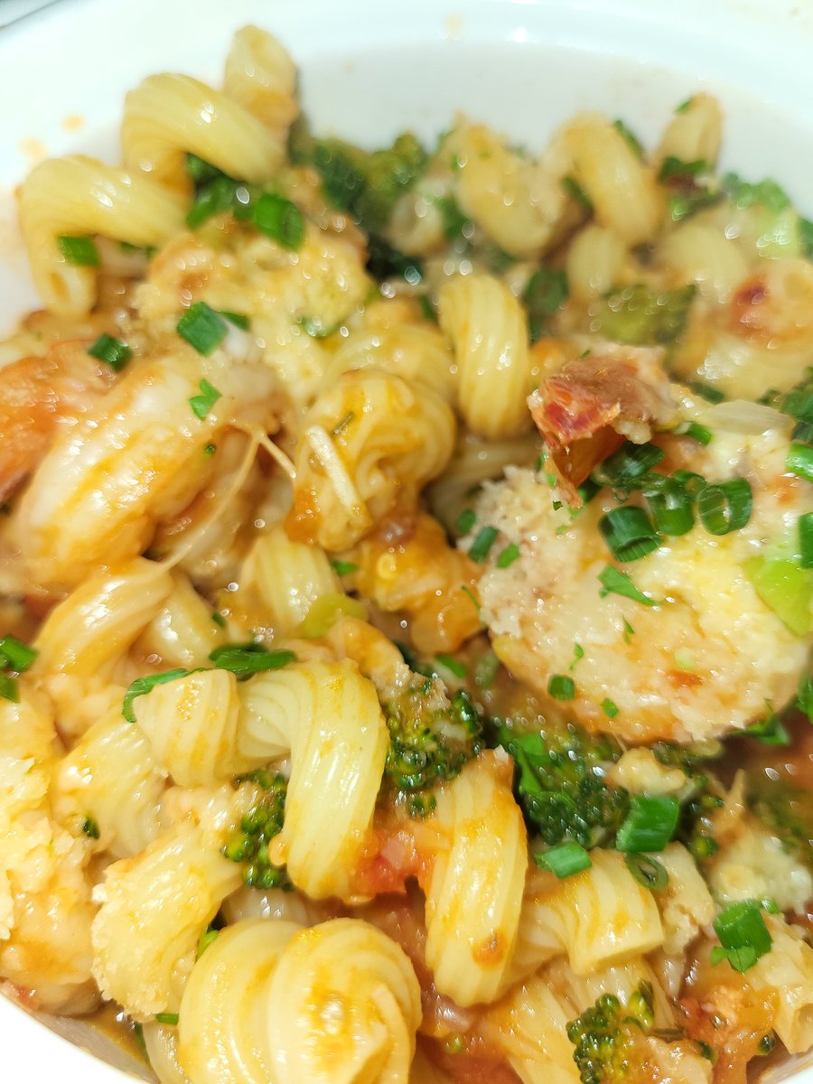 I waited my whole shift to come home and make this. It's cavatappi in a vodka sauce with shrimp and herbs. I like to simmer the shrimp in the sauce with garlic and shallot, beautiful flavor.