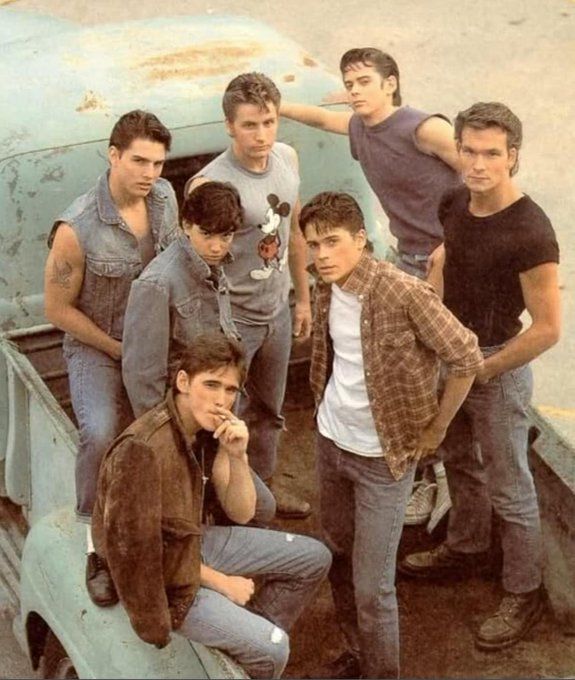 Tom Cruise, Matt Dillon, Patrick Swayze, Ralph Macchio, Emilio Estevez, C. Thomas Howell, and Rob Lowe on the set of 'The Outsiders,' 1983.