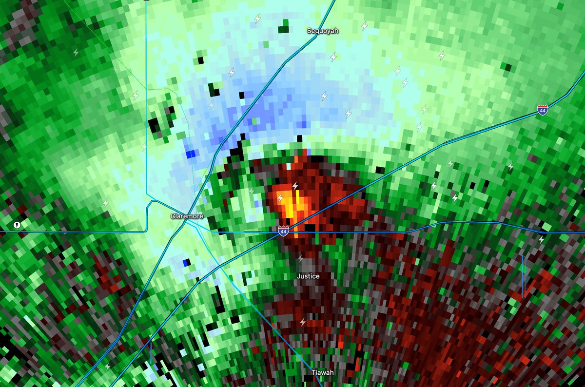 an intense couplet just E of Claremore Oklahoma, a large destructive tornado continues