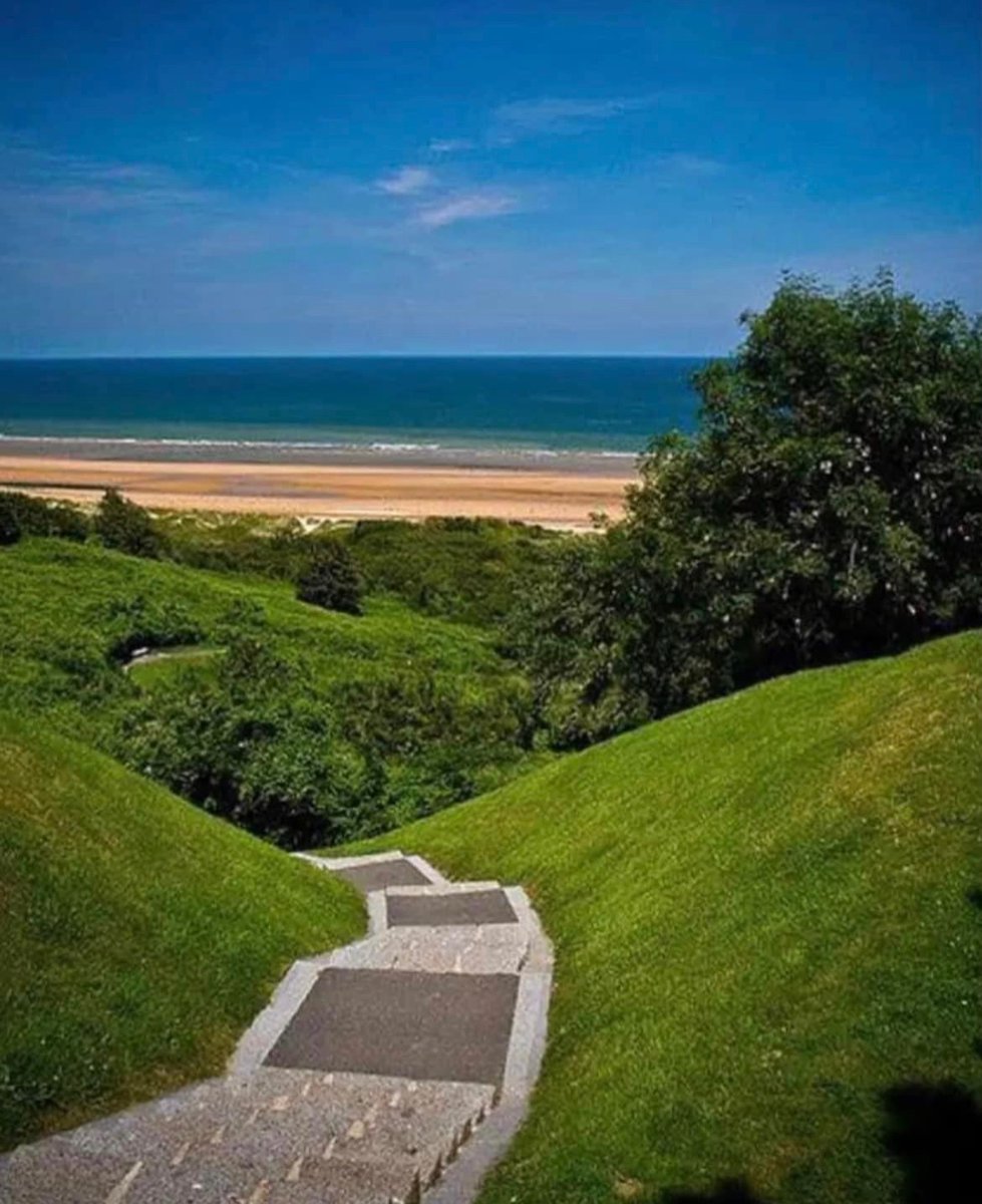 The view of Omaha Beach from the American cemetery in Normandy. 🇺🇸