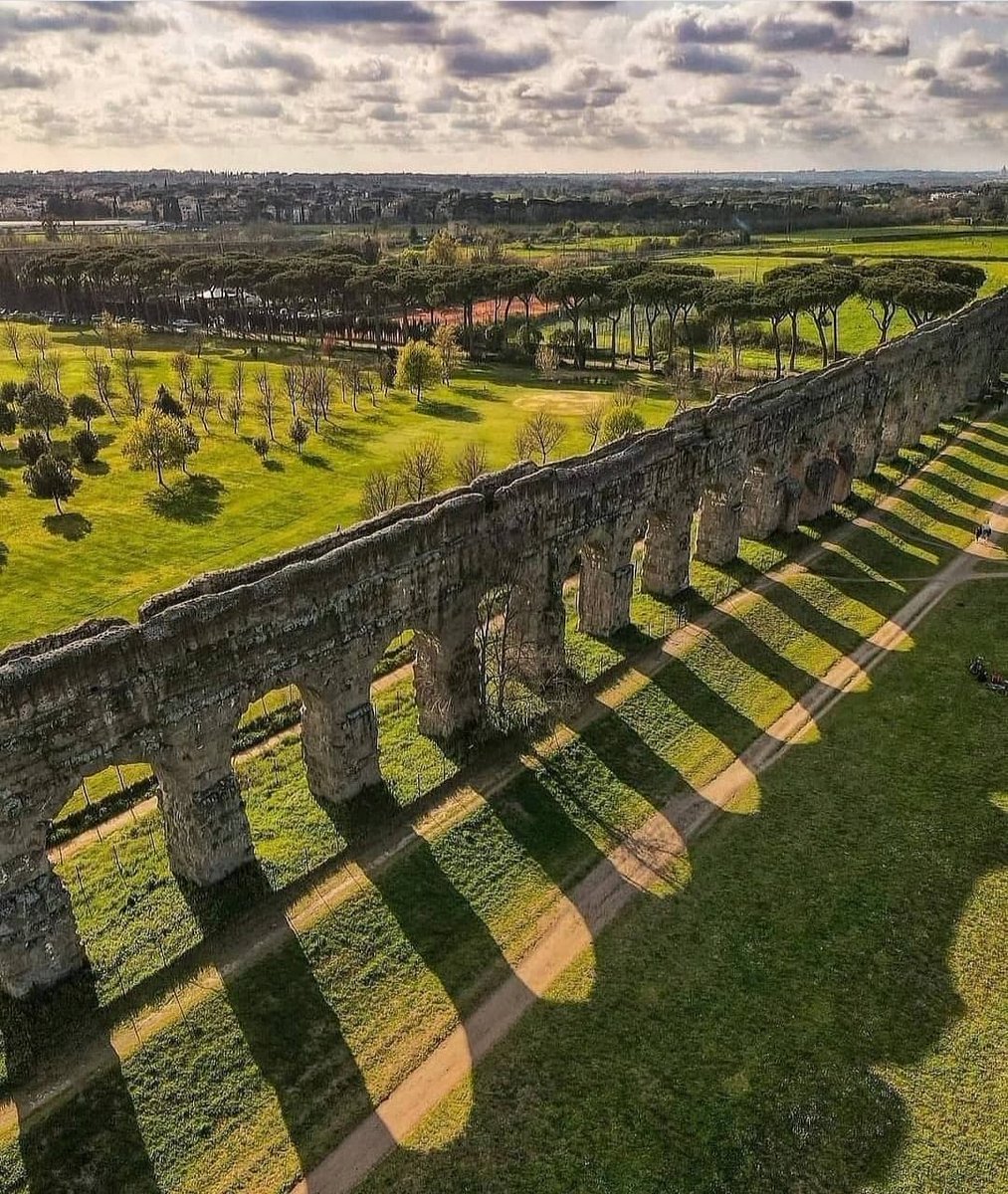 For #ancientsitesunday this stunning aerial view of the Parco degli Acquedotti, south east of #Rome. The park is named for its seven aqueducts which supplied the city with water. 

Photo: Valentino Ligori

#romanarchaeology