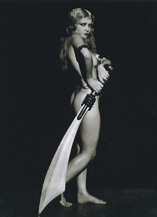 Marie Hopkins, sporting a sexy and fierce costume for The Ziegfeld Follies in a 1930 photograph by Charles Sinclair Bull. In a strange twist, the photo, at times, has been misidentified as Anita Page.