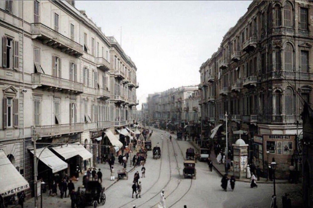 “It goes on being Alexandria still.” – Street scene of Ramleh Boulevard, Alexandria. Photo: Roger Viollet, 1920.