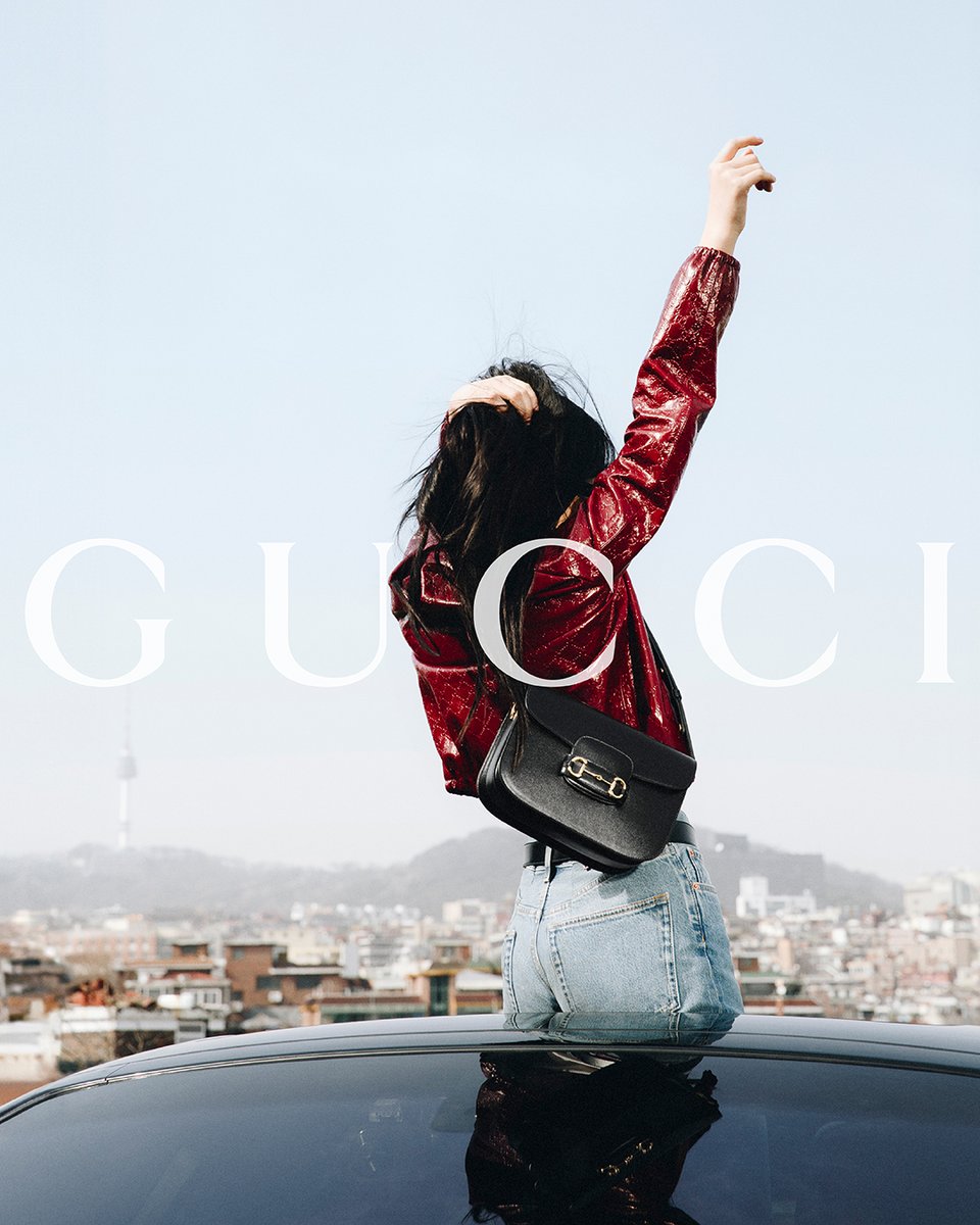 gucci's tweet photo. #Hanni from @NewJeans_ADOR continues her journey with the House throughout dynamic city streets in a new campaign with the #GucciHorsebit1955 bag. Discover more https://t.co/0A9b428k8V https://t.co/cP7CxBBXcI