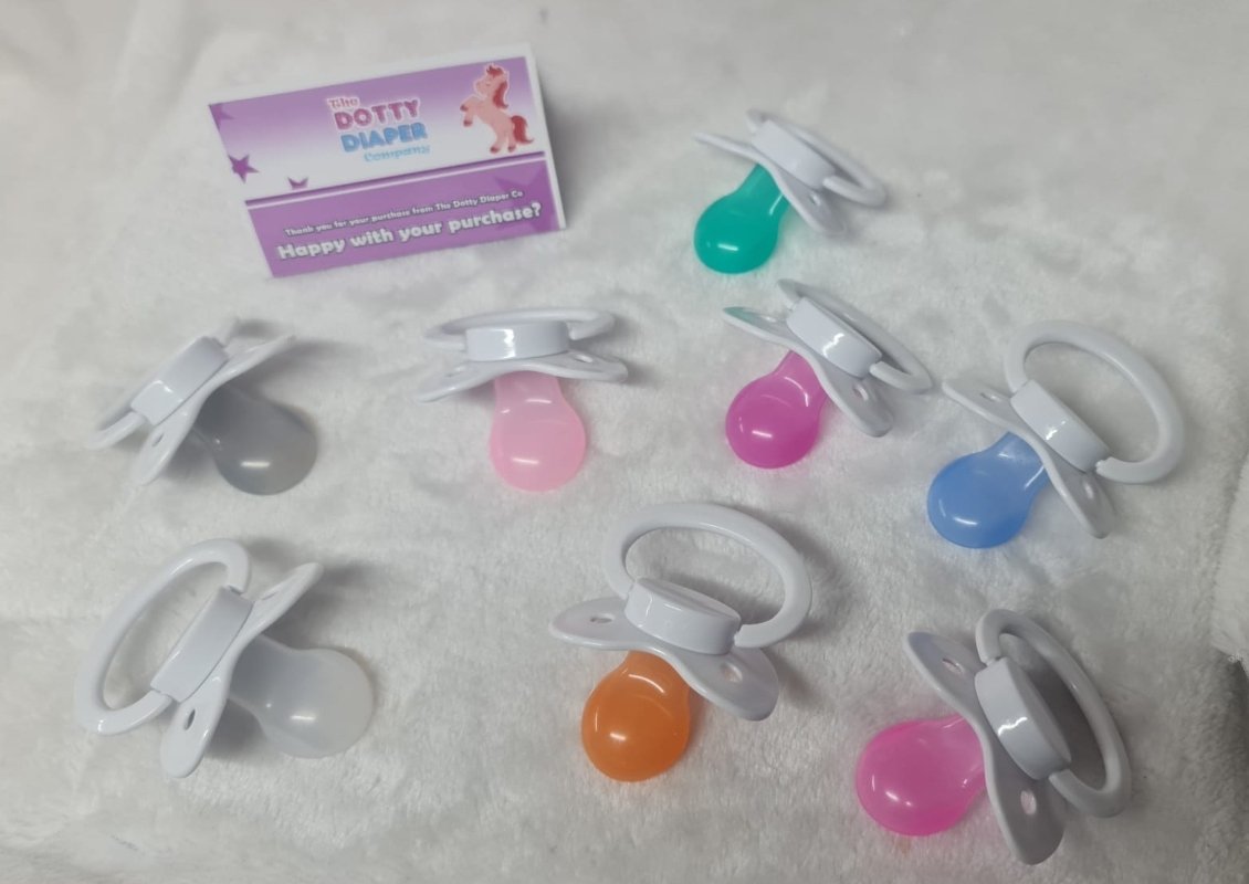 Pacifiers, sure, we have got 100s to choose from🏆 Starting at £4.99😮 Shipping quickly discreetly and cheaply worldwide from: dottydiaper.co.uk