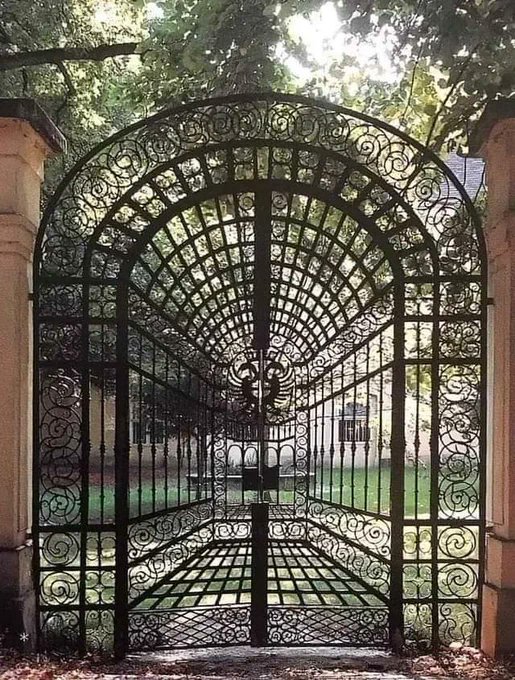 This gate at the Theresianum Academy in Vienna uses a one-point perspective, it appears to extend back into space and makes it look like the actual wrought iron gate is much farther down the path. But thanks to its clever use of line and scale, it all sits on a flat plane.