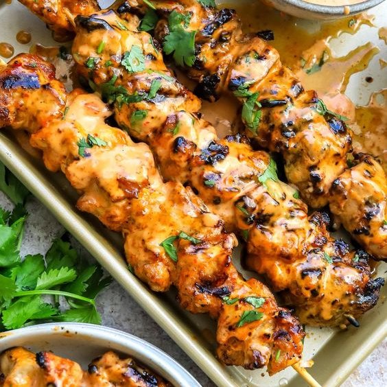 Bang Bang Chicken Skewers Grilled or air fried spicy Bang Bang Chicken Skewers seasoned and slathered with sweet and tangy bang bang sauce and cooked to perfection.