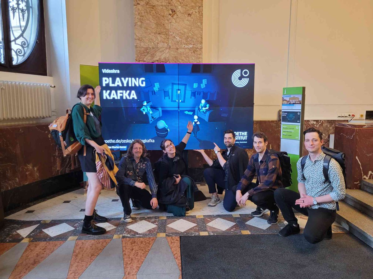 Thank you very much to all of you for playing our game, Playing Kafka! We took this photo right after the release celebration at the Goethe Institute in Prague. @GI_Tschechien Playing Kafka is available for free -> LINK IN BIO! #kafka #franzkafka #indiegame #videogame