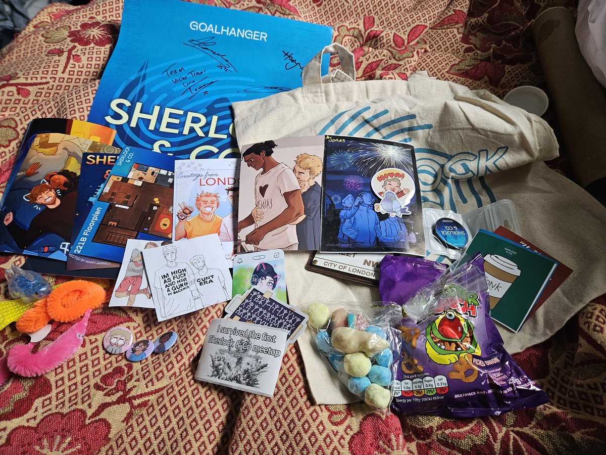 weirdgirlcore's tweet photo. finally woke up and managed to sort through everything I got yesterday at #sherlockandcomeetup thank you to everyone who handed stuff out I will treasure it forever and shoutout to the sh&amp;co themed sweets from the quiz prize especially 🩷🩷🩷 #teamvictortrevor https://t.co/M3U4nF7tXc