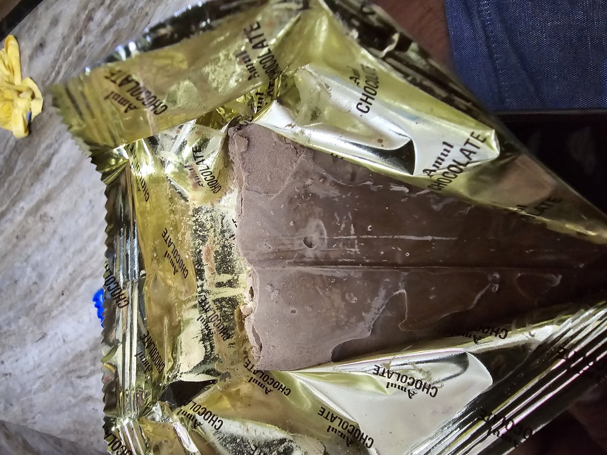 agnithefire's tweet photo. Sham from https://t.co/1hkbRg7hYh purchased Amul chocolate from BPCL In & OUT store CS PUR BBSR, opened it, and 1/3rd of it was missing! @Amul_Coop @DairyAmul @AmulOdisha @amulcares, should I wait or eat? 🤔🍫 #AmulMissingChocolate #MissingChocolate #AmulSurprise https://t.co/GvILplQFd0