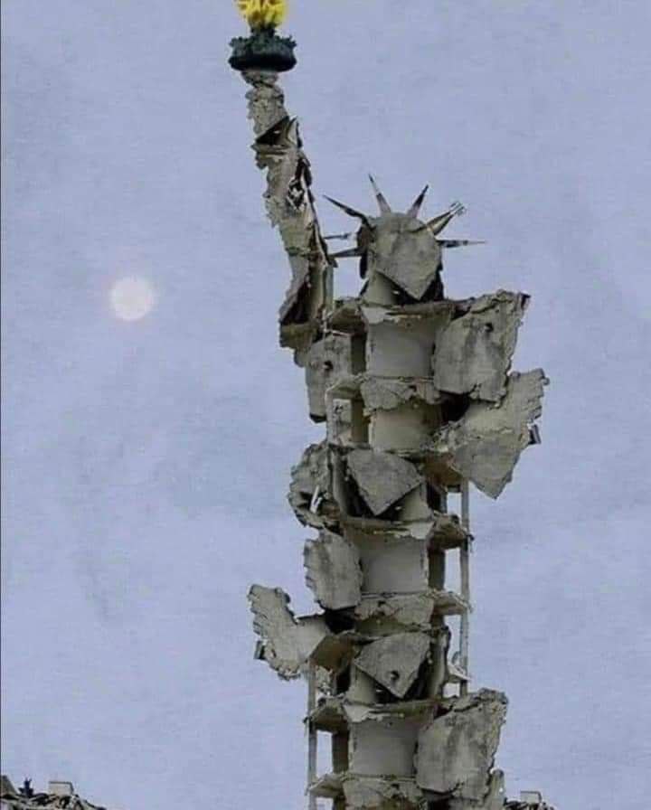 This was built by a Syrian artist from the ruins of his house. 

With the slogan: 'This is the freedom they brought us.'