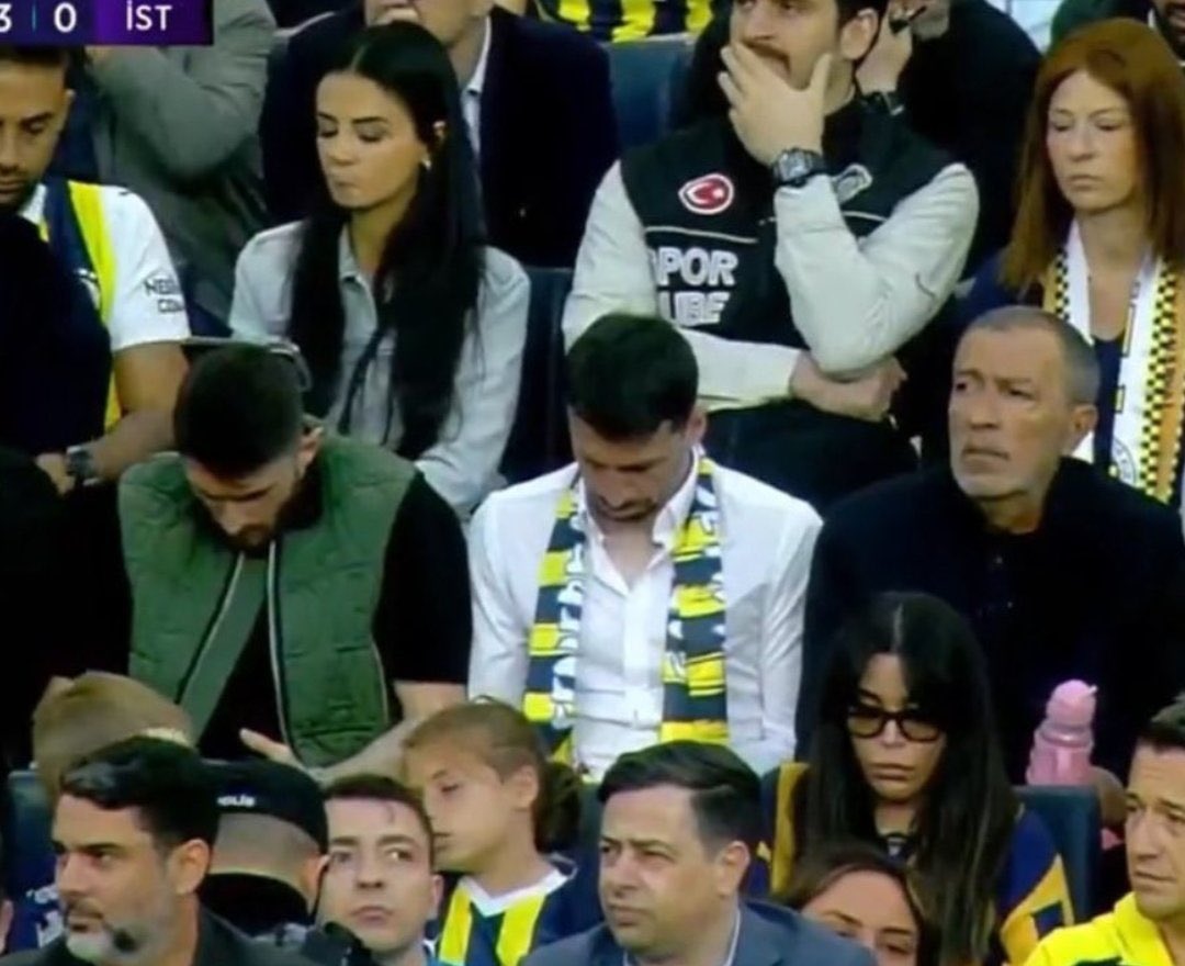 Fenerbahce fans all look disappointed because they’ve checked their phones and seen Galatasaray are winning 😭😭