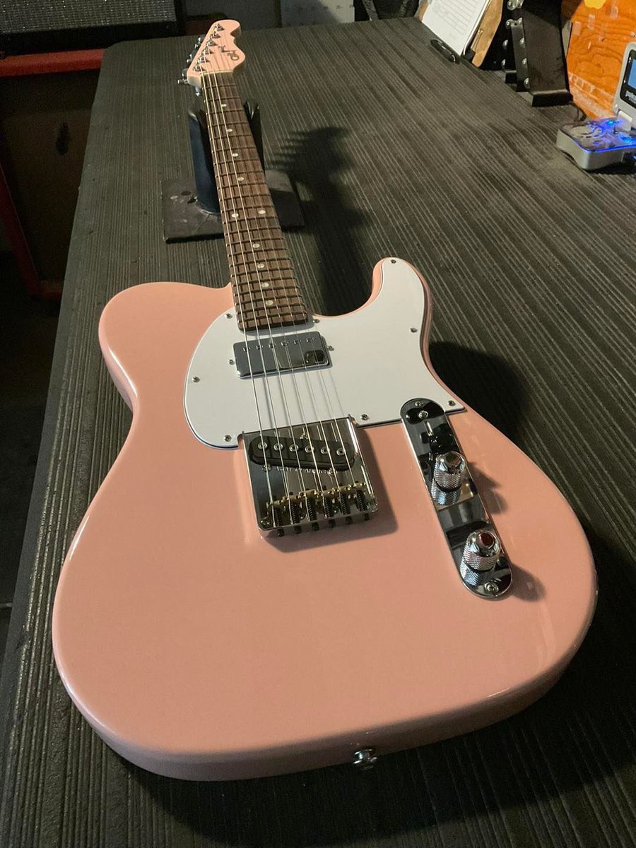 ASAT Classic Bluesboy Semi-Hollow in Shell Pink over alder, f-hole delete, 3-ply white guard, hard rock maple neck with rosewood fingerboard, Light Tint Satin finish, matching headstock, locking tuners. Built for G&L Premier Dealer UpFront Guitars in Bellingham, Massachusetts.