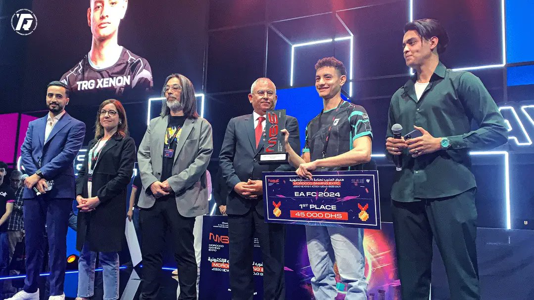 TwaregEsports's tweet photo. Ladies and gentlemen🎙️
Our player, @TrgXenon is the Champion of the Moroccan Gaming Expo in FC24! 🏆 
Out of 780 players, our star conquered all, taking home 45,000 dirhams 🤑.
Glory reached! GLORY ACHIEVED.
#TRG_Family #MoroccoGamingExpo #fc24 https://t.co/gORbqdSevd