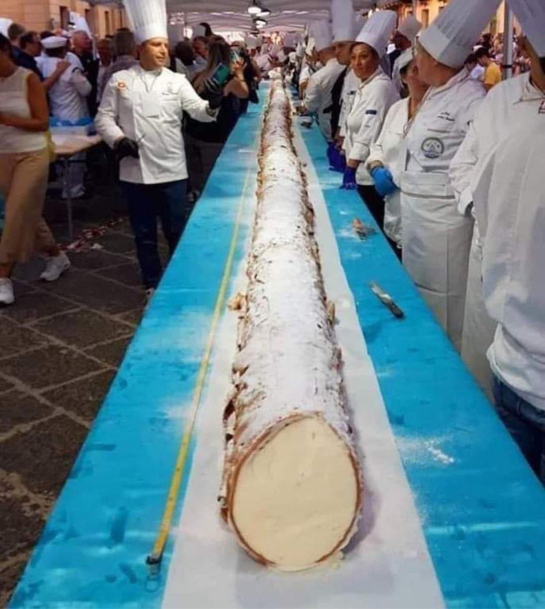 Here is a photo of the largest cannolo in the entire world, made in Caltanissetta, Sicily. It destroyed the previous record in Guinness World Records. The large and spectacular sweet was made by Sicilian pastry chefs, including master pastry chef Lillo Defraia.