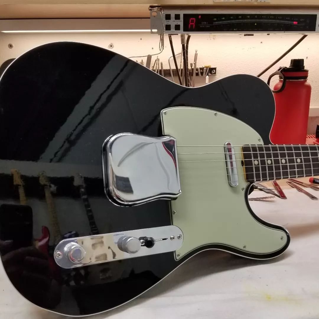 Check out this 1960 Black Tele from David Brown, featuring a Mint pickguard and a Deluxe Closet Classic treatment. What a beaut!