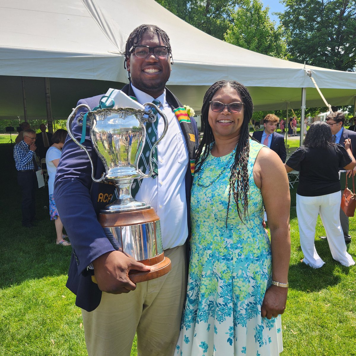 <a href="/RealCJWilliams/">CJ Williams</a> and mom Annette at graduation after winning  the Deerfield  Cup! CJ is off to <a href="/VandyFootball/">Vanderbilt Football</a> in the fall.  Way to go CJ!