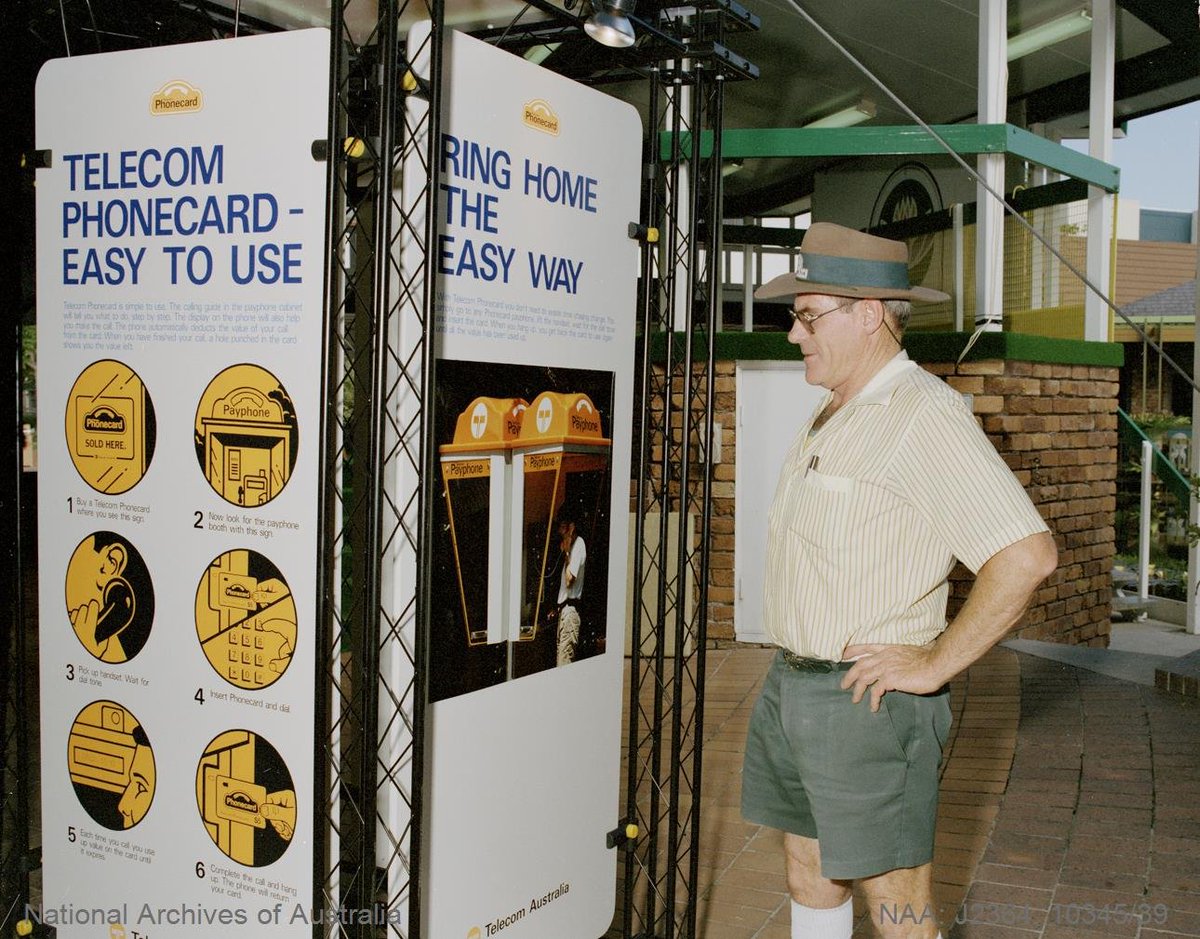 A display explains Telecom Australia's new phonecard system in a Queensland shopping centre in 1990 (National Archives of Australia)