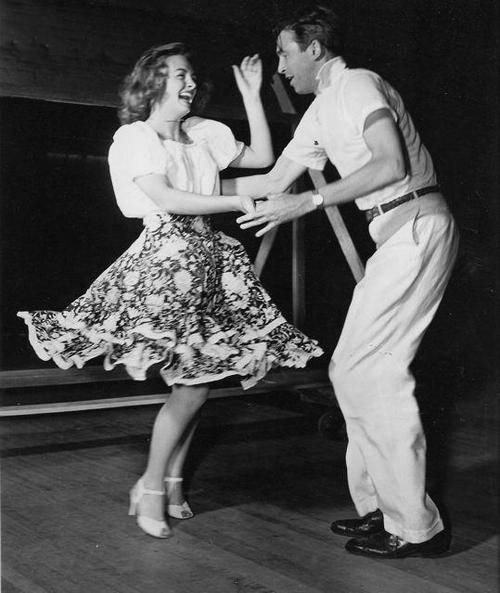 Jimmy Stewart and Donna Reed joyfully practicing their dance on the set of 'It's A Wonderful Life' (1946)