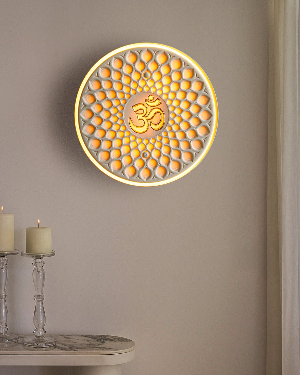 Om is the sacred syllable of the Dharmic religions of Hinduism and Buddhism, symbolizing unity with the supreme. The symbolism and decorative beauty of this wall light will help you reconnect. More info at lladro.com #Lladró #HandmadePorcelain #UniqueCreations