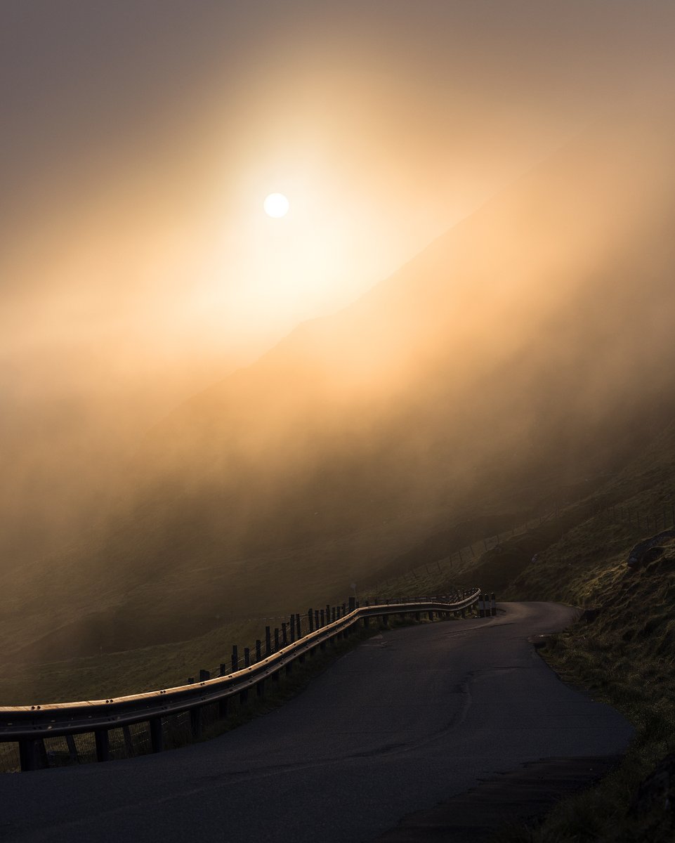 Heading home one morning last week, we could see fog hanging around further north on Skye so continued past the house to see what we could find. I couldn't resist stopping for this scene looking down the road, with the sun glowing through the cloud. #fsprintmonday