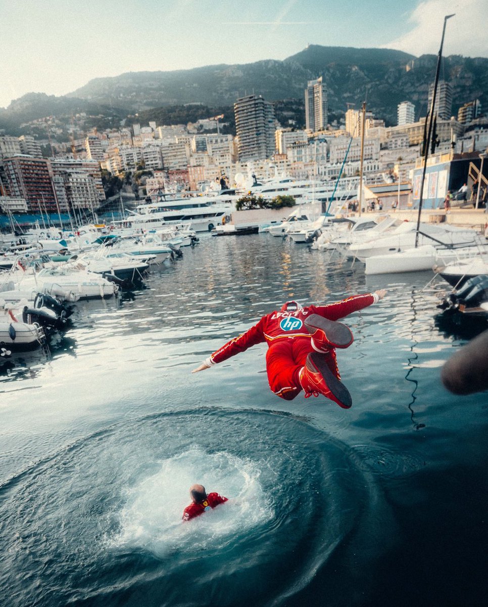 What a photo on ⁦@Charles_Leclerc⁩’s social media after his win at the Monaco Grand Prix, of him diving into the harbour after team boss Frederic Vasseur