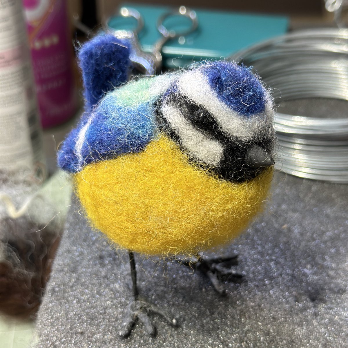 A wee needle felted blue tit on my pad today!