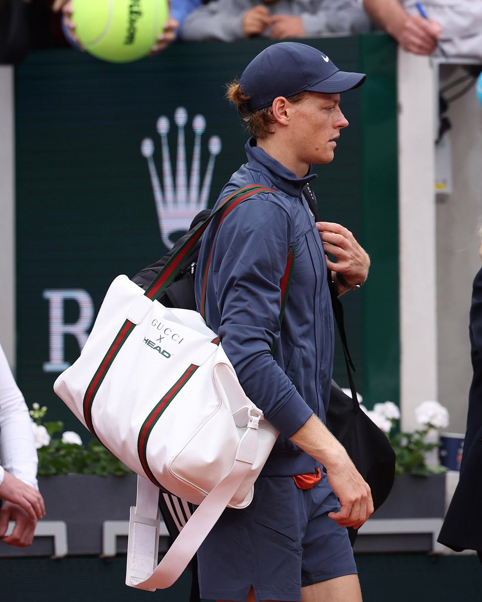 Global Brand Ambassador @janniksin on the court in Paris with his new #Gucci custom duffle bag designed in collaboration with @head_tennis.