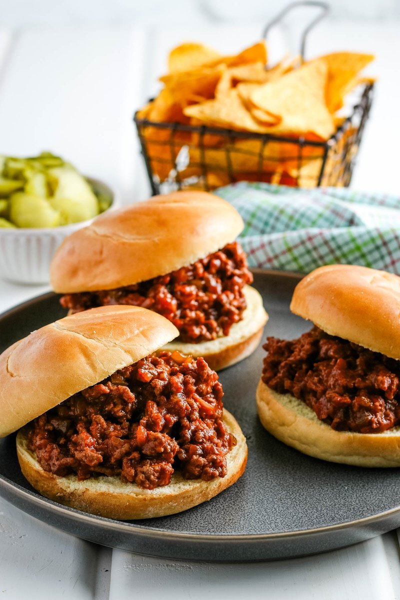 How to make delicious #CrockPot sloppy joes with simple ingredients. Easy comfort food recipe that you can make in a large batch to feed a crowd, or at home as the ultimate weeknight dinner the whole family will love. adventuresofmel.com/crock-pot-slop…