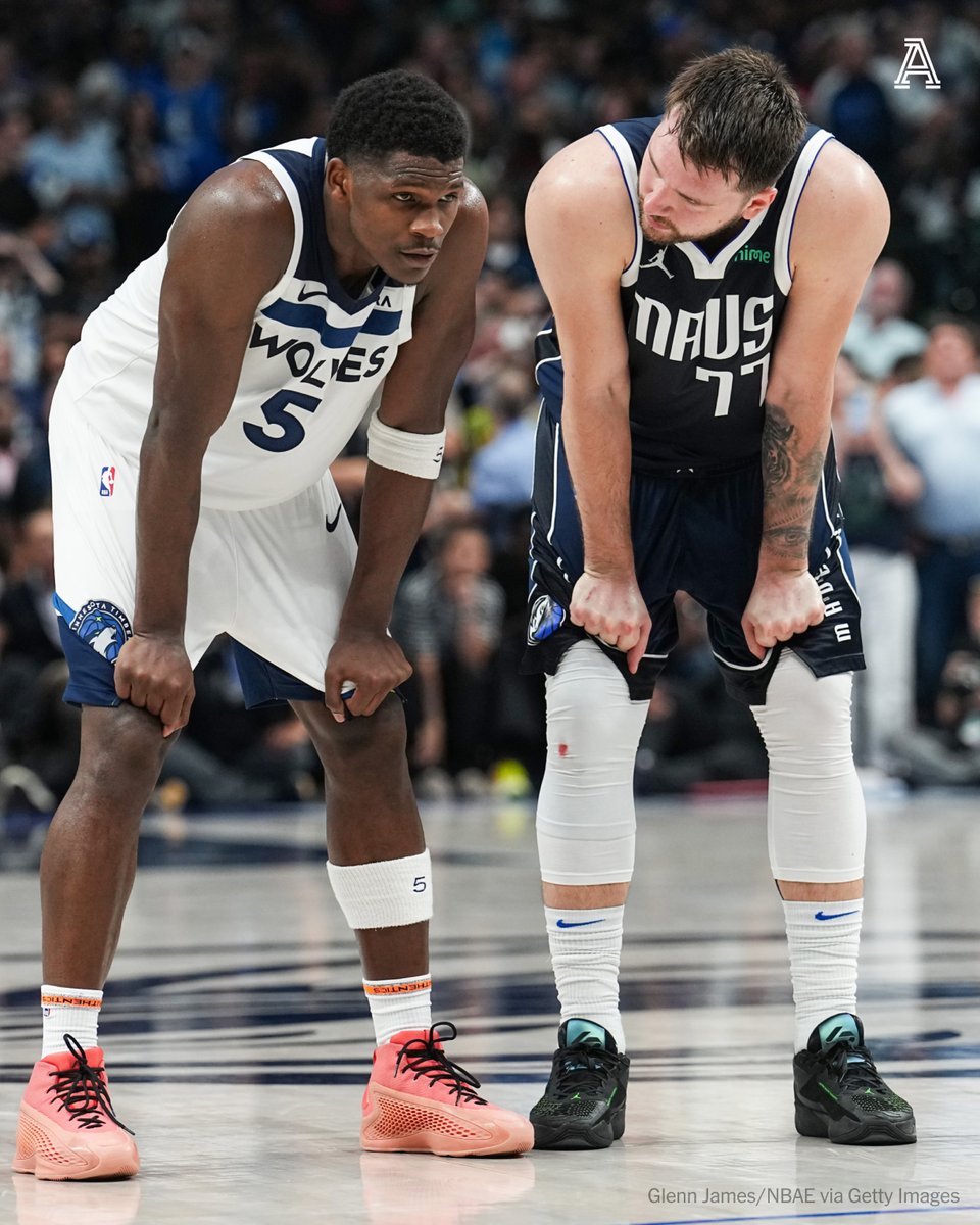 What was said here between Luka Dončić and Anthony Edwards? 📸 Glenn James/NBAE via Getty Images