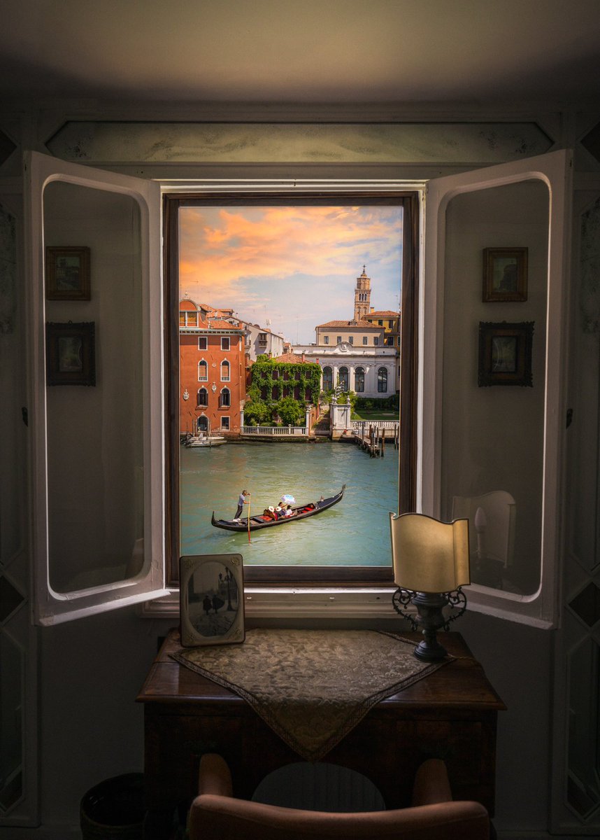 Gm photography family ☕️☀️ A view of Venice’s Grand Canal framed from the ornate window of Ca’ Biondetti 🧡